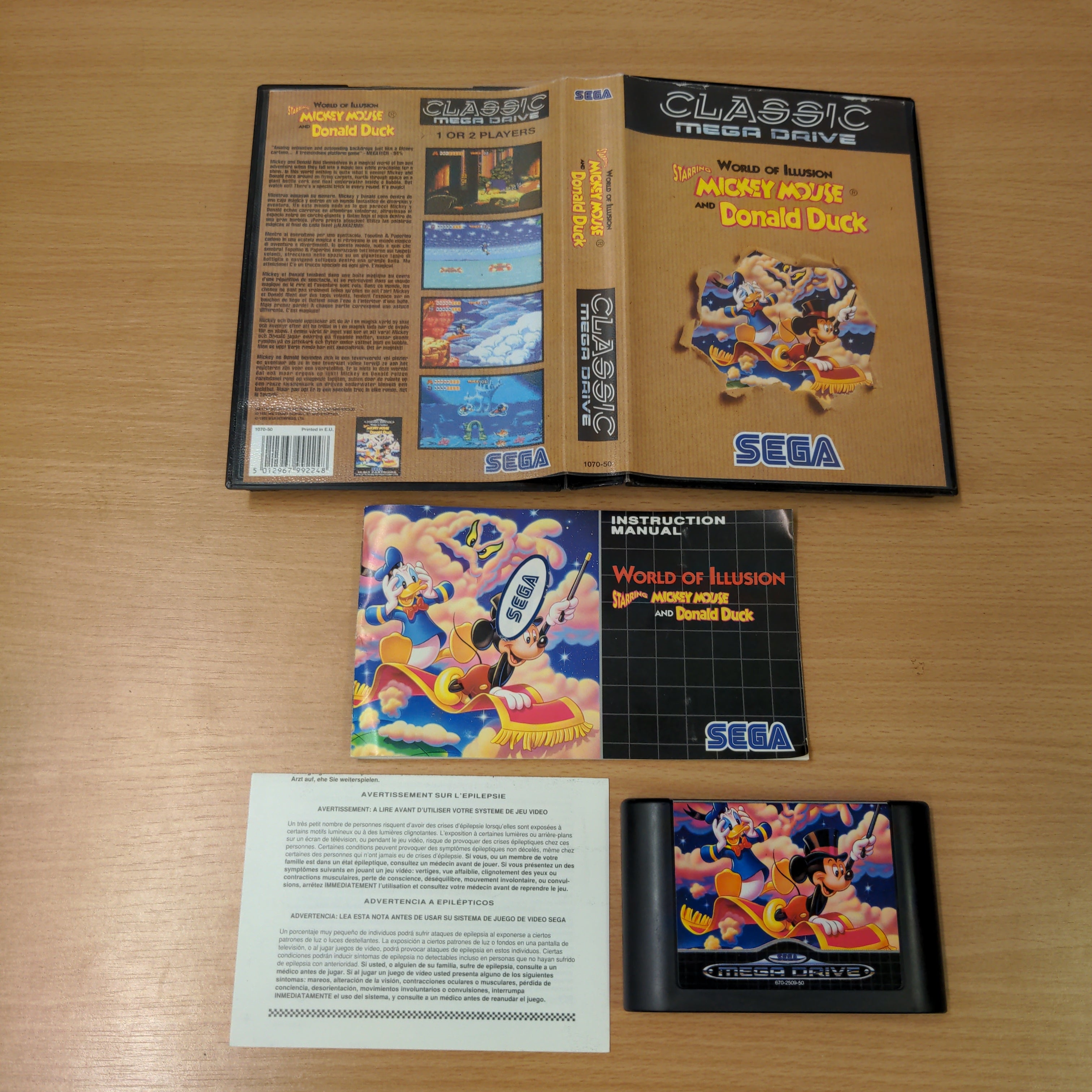 World of Illusion starring Mickey Mouse (Disney's) brown box classic Sega Mega Drive game World of Illusion starring Mickey Mouse (Disney's) brown box classic Sega Mega Drive game